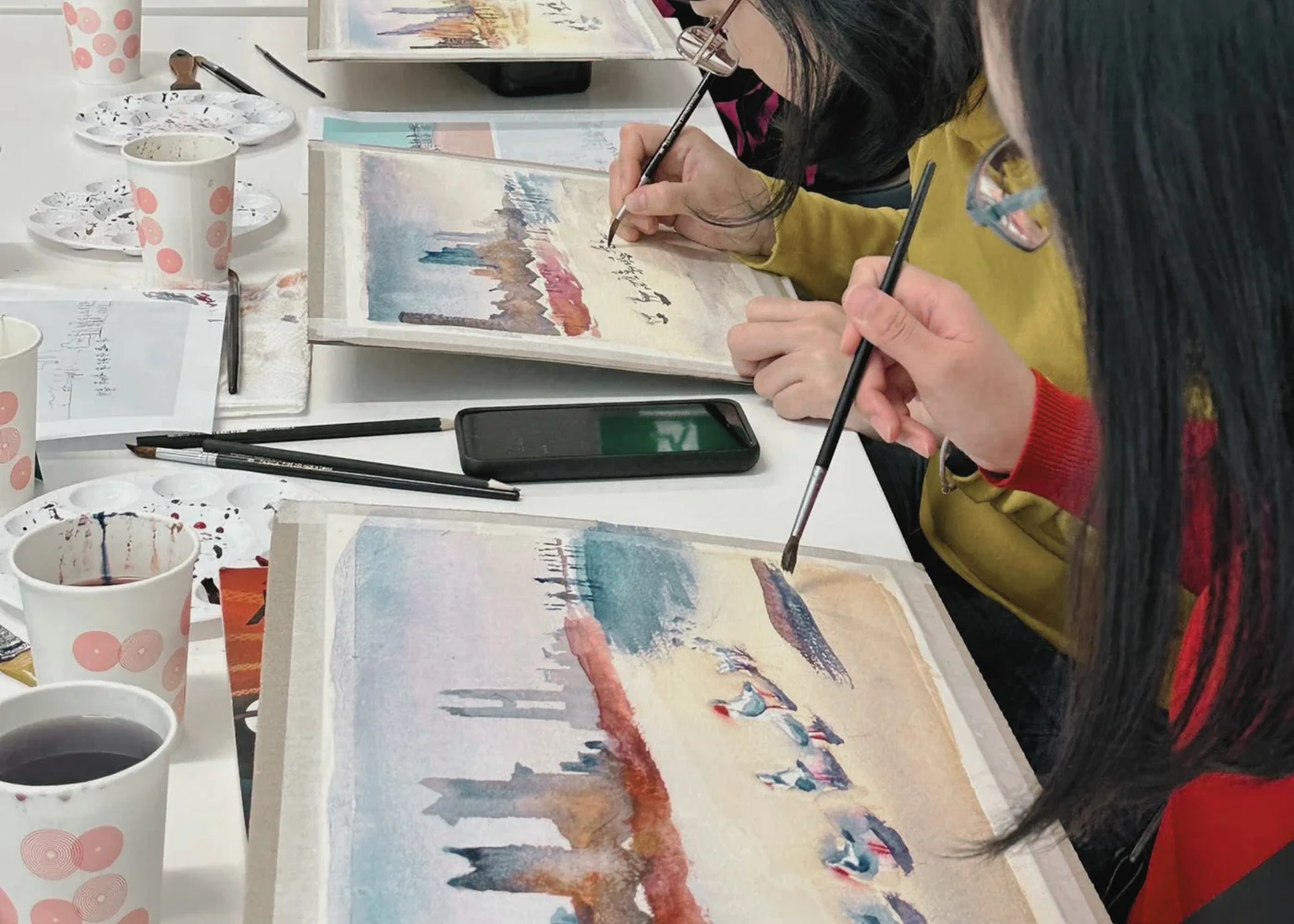 Arafat Hosen working with participants at a Sienna Arts creative learning session